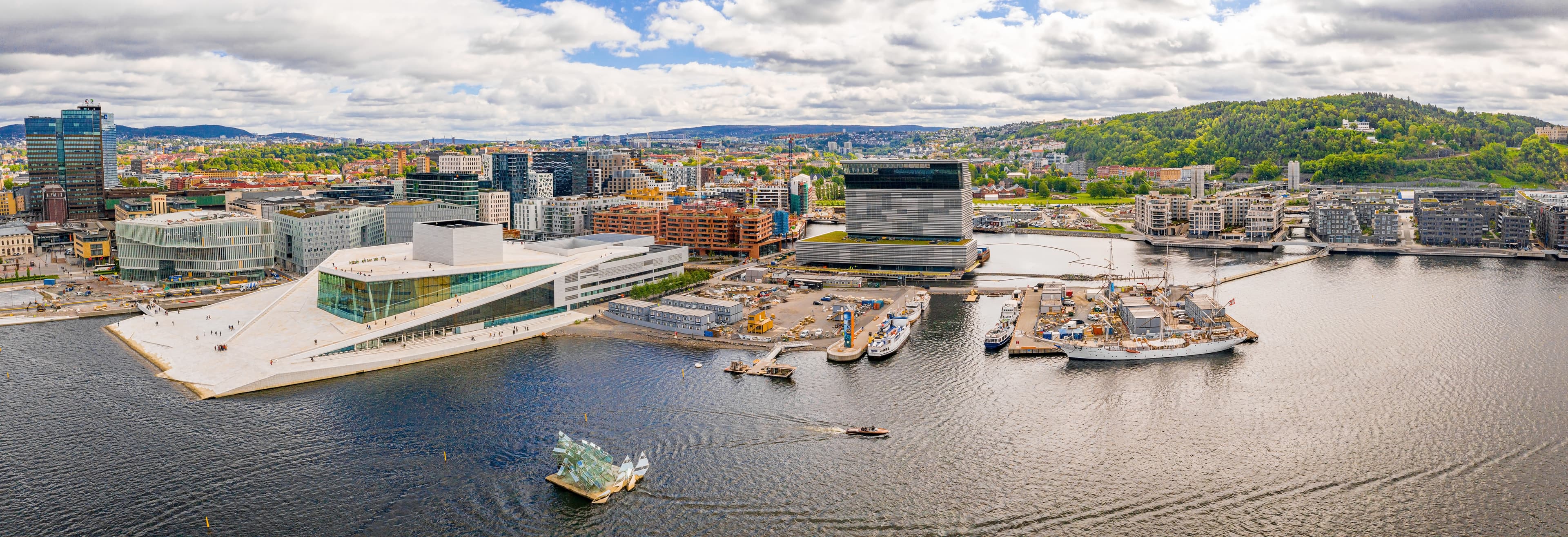 Oslo Opera House and Bjørvika waterfront at dusk, Norway