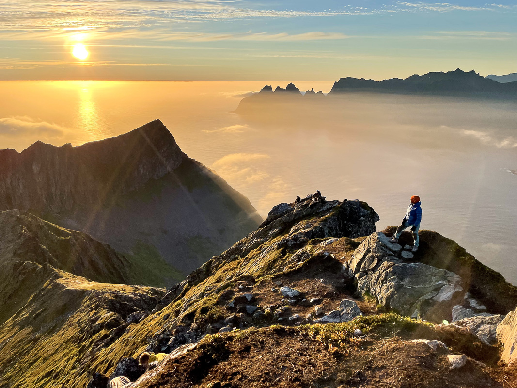 Rocky mountain trail on Husfjellet, Senja, with clouds closing in from the west