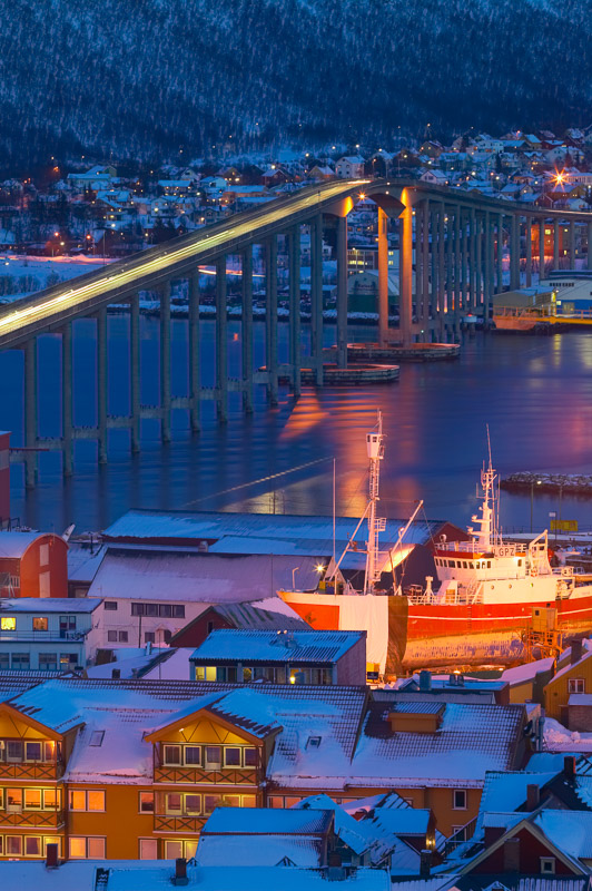 Tromsø panorama with snow-covered peaks across the strait, winter light over the Arctic city